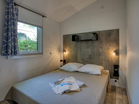 Photo chambre parents dans location Sarlat